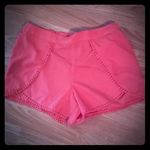 Jessica Simpson orange short shorts